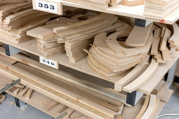 wooden parts for assembly in a furniture workshop