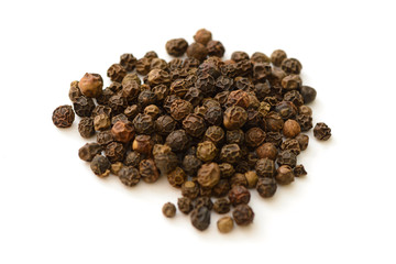 peas of black pepper on a white background