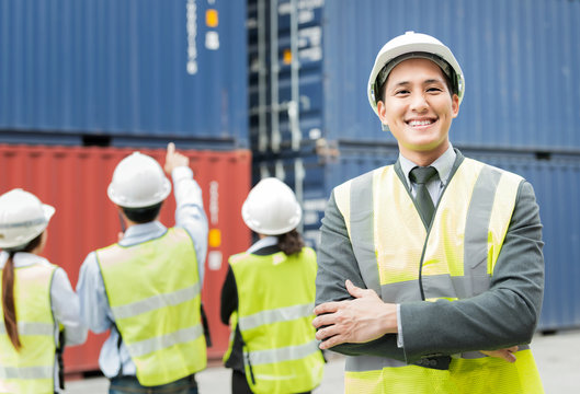 Portrait of smiling male manager in the Warehouse shipping transportation concept.