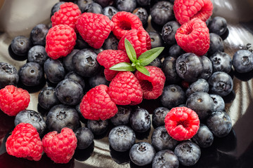 Mix of blueberries and raspberries.