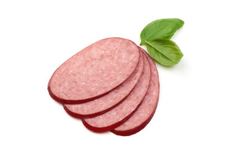 Salami sausage slices with basil leaf isolated on white background