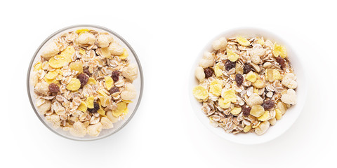 Cereal muesli in glass bowls isolated on white