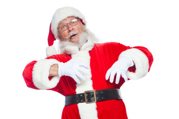 Christmas. Good Santa Claus in white gloves shows faces, grimaces, shows his tongue. Not standard behavior. Isolated on white background.