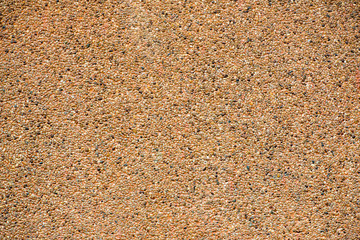 Texture washed sand background. Small sand stone of sand wall texture or sand wall background. floor background texture. wash gravel, wash stone