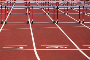 Hurdles on competition background