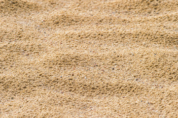 The texture of the sand after the rain