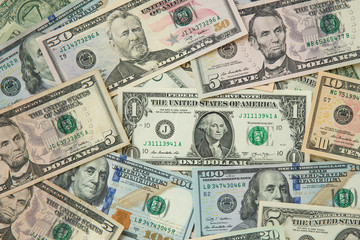 money american hundred dollar bills Pile of various currencies isolated on white background.Closeup of assorted American banknotes.US currency scattered on the table.america currency dollor currency.