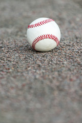 one baseball on infield of sport field