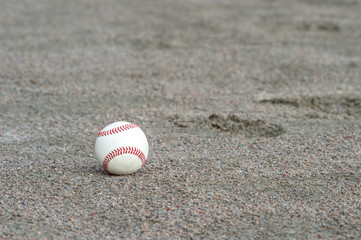 one baseball on infield of sport field