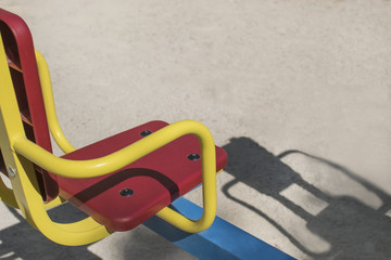 an empty carousel for children on a clear summer day