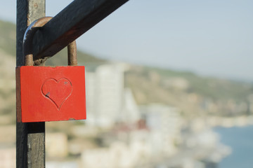 red rusty castle with the engraving of the heart