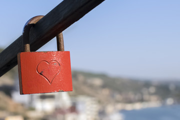 Old red castle with engraving of the heart