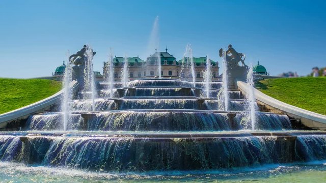 The fountain in the Belvedere historic building complex in Vienna, Austria. Time lapse. Zoom effect
