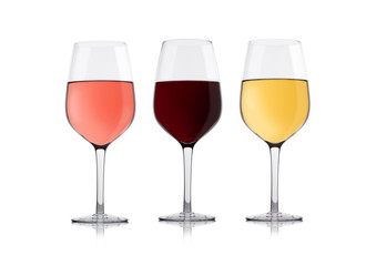Glasses of white red and pink rose wine on white