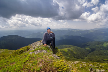 The girl is a tourist in the Carpathian mountains. Ukraine