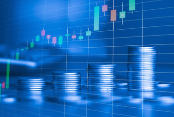 Stack of money coin with trading graph, financial investment concept use for background