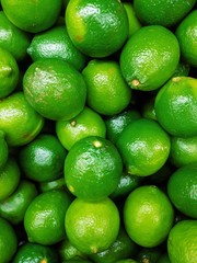 lots of ripe fresh green lime top view (Mobile photography)
