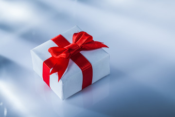 Packed red gift box on white background