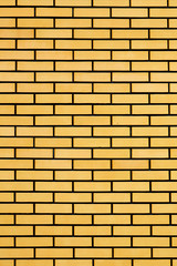 Fototapeta premium Yellow brick wall texture