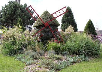 paysage d'un moulin avec  des plantations