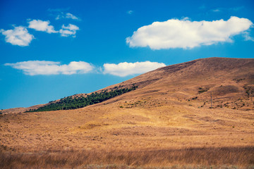 Fototapeta na wymiar View of mountains against blue sky