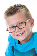 cheerful child boy with glasses on white background