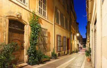 Fototapeta na wymiar The old street in the historic quarter Panier of Marseille in South France at night