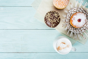 Coffee and cakes for breakfast, top view, advertising space