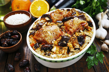 Chicken thigh baked with rice, eggplant and figs