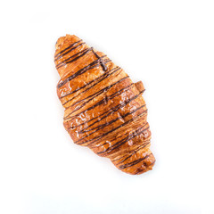Chocolate croissant on white background, top view