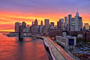 Foto op Plexiglas View of Lower Manhattan with Brooklyn Bridge at at Amazing Sunset, New York City © romanslavik.com
