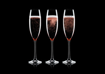 Rose pink champagne glasses with bubbles