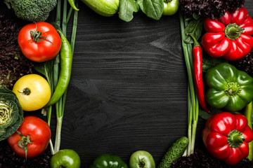Assortment of vegetables arranged in the frame shape, with space for text or advertising