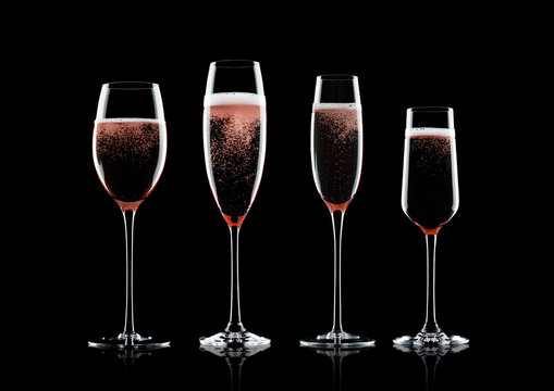 Rose pink champagne glasses with bubbles