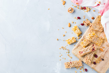 Obraz na płótnie Canvas Healthy homemade cereal muesli granola bars for breakfast