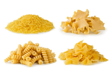 Set of 4 piles of pasta of different shapes on a white. isolated.