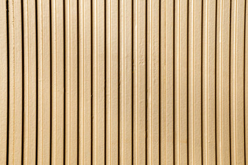 Textured metal wall in gray color.