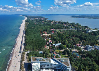Aerial view on tourist during summer vacation on beach at sea.