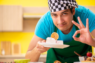 Man cook preparing cake in kitchen at home