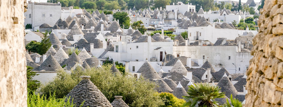 Scenic panoramic view of Alberobello and trulli buildings, Apulia, Italy