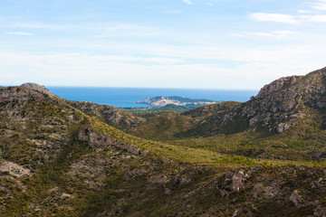 Ladscape with mountains and the sea in the background near Arta, Mallorca, Spain