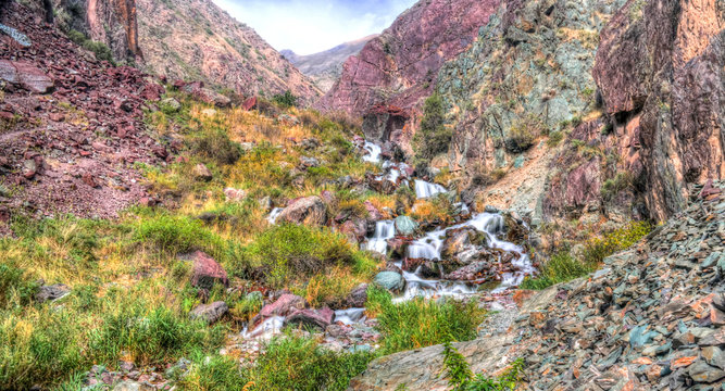 Small waterfall to Too-Ashuu pass and Kara Balta river and valley,Chuy Region of Kyrgyzstan