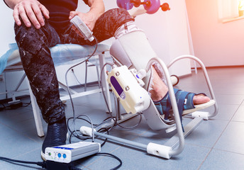 Patient on CPM (continuous passive range of motion) machines. Device to provide anatomically correct motion to both the ankle and subtalar joints.