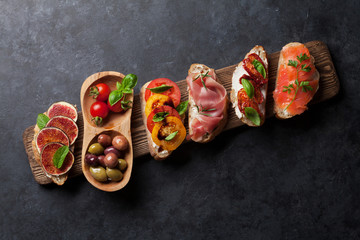 Brushetta or spanish tapas set - obrazy, fototapety, plakaty