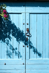 Blue wood door in a french village
