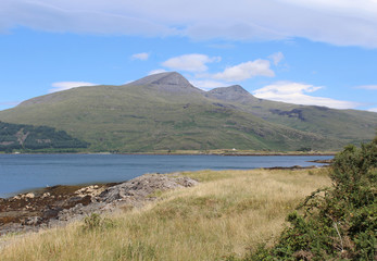 Fototapeta na wymiar The mountain of Ben More, as viewed from Pennyghael looking across Loch Scridain on the Isle of Mull.