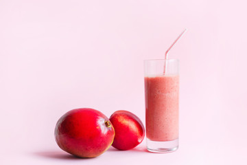 Fresh pink smoothie with peach and mango
