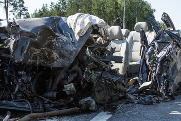 Car after frontal collision with a truck  in Latvia on the road