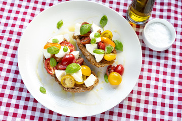 plate lunch tomato cheese mozzarella basil vegetarian italy heirloom cloth