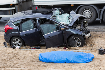 Car after frontal collision with a truck  in Latvia on the road